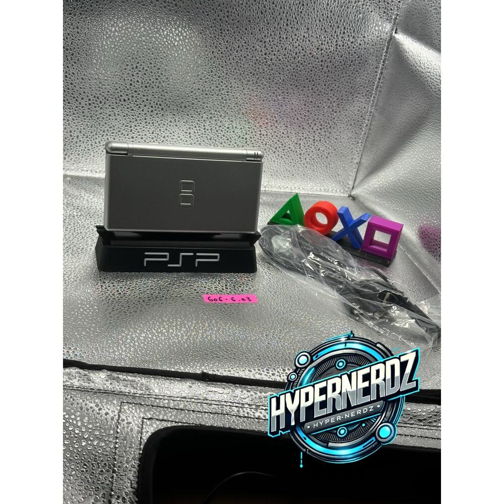 Sliver nintendo ds lite w/new battery,button pad,bottom screen & charger